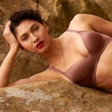 Five petite bras laid out as a vacation packing capsule for smaller busts